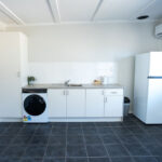 the goldminer deluxe studio kitchenette and laundry facilities