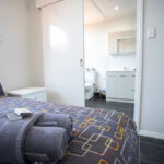 the goldminer deluxe studio bedroom with ensuite