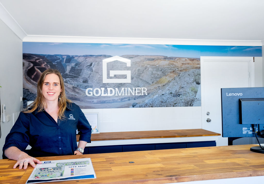 The Goldminer reception area with team member