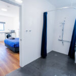 the goldminer accessible studio apartment view from bathroom to unti