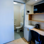 the goldminer executive cabin ensuite and desk